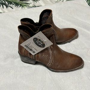 Brown Cowboy boots, bought in Nashville. Tags still on